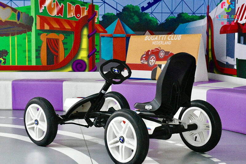 Custom themed indoor playground structure with sculpted elements and soft play zones